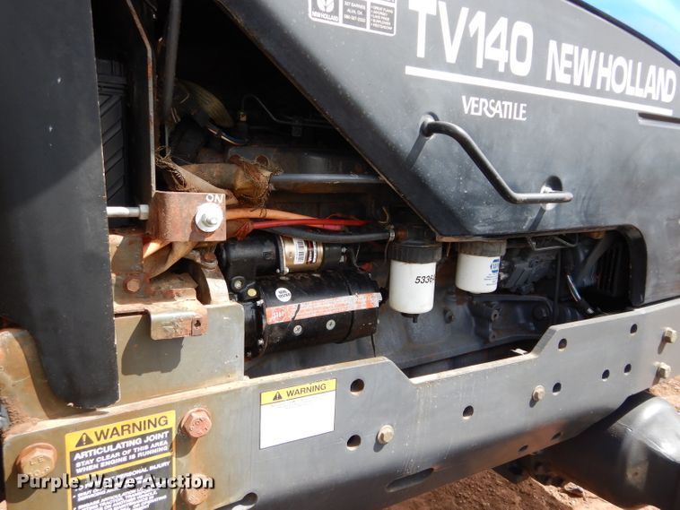 image for item GK9164 New Holland TV140 bi-directional tractor