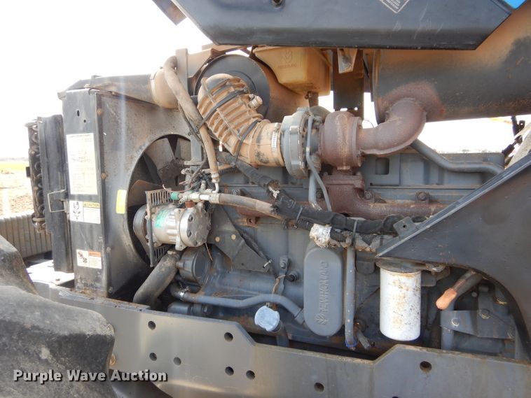 image for item GK9164 New Holland TV140 bi-directional tractor