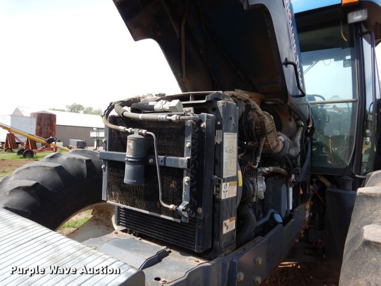 image for item GK9164 New Holland TV140 bi-directional tractor