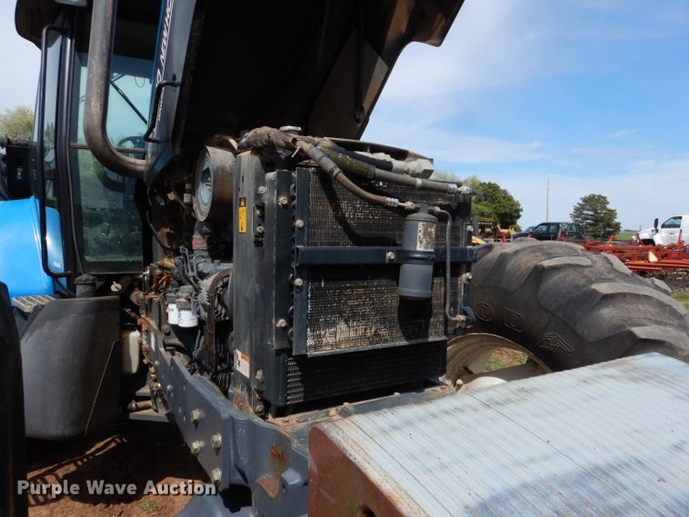 image for item GK9164 New Holland TV140 bi-directional tractor