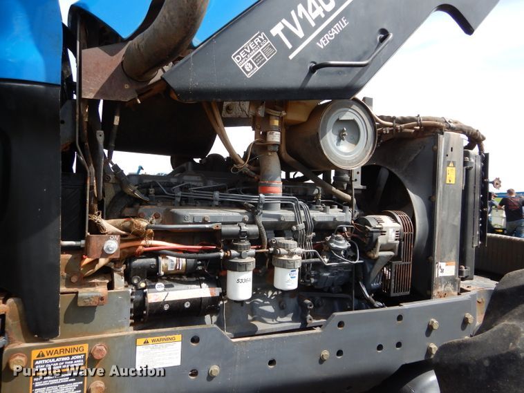 image for item GK9164 New Holland TV140 bi-directional tractor