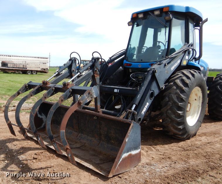image for item GK9164 New Holland TV140 bi-directional tractor