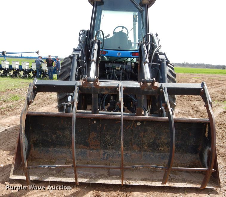 image for item GK9164 New Holland TV140 bi-directional tractor