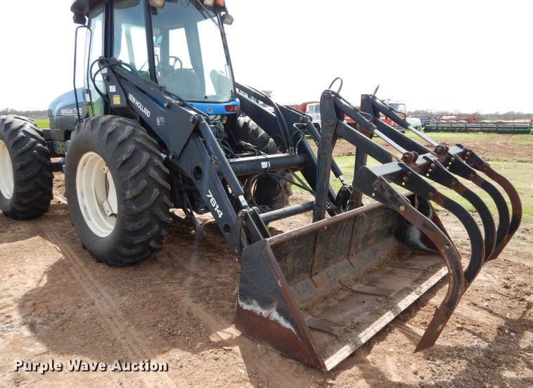 image for item GK9164 New Holland TV140 bi-directional tractor
