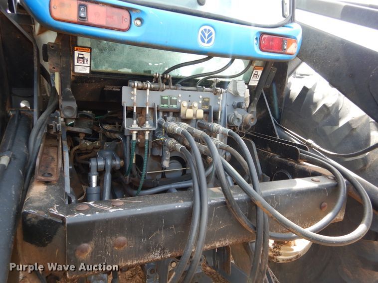 image for item GK9164 New Holland TV140 bi-directional tractor