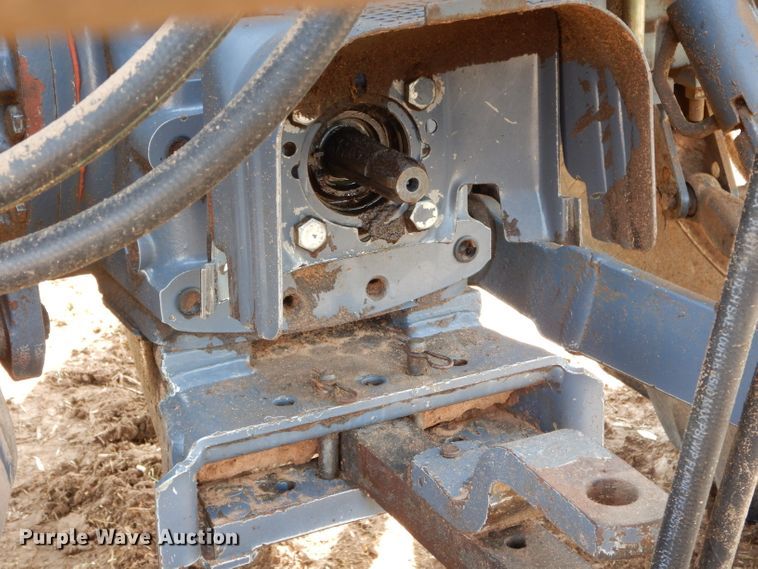 image for item GK9164 New Holland TV140 bi-directional tractor