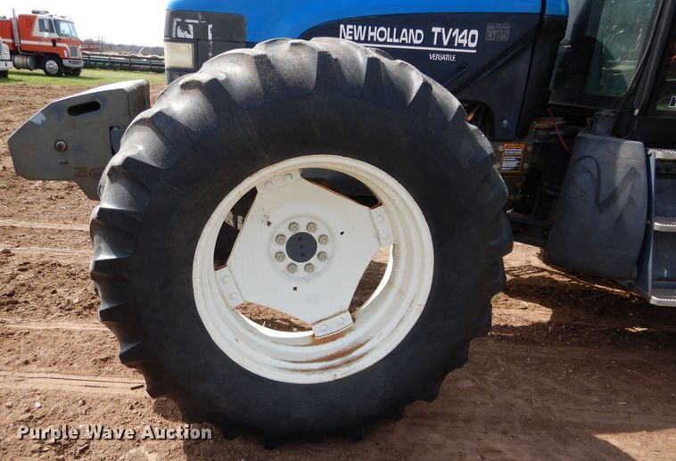 image for item GK9164 New Holland TV140 bi-directional tractor