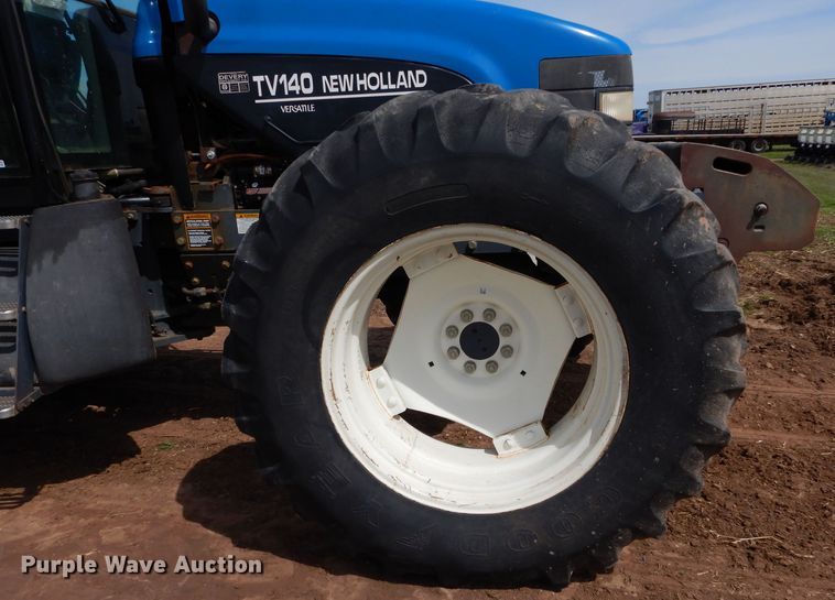 image for item GK9164 New Holland TV140 bi-directional tractor