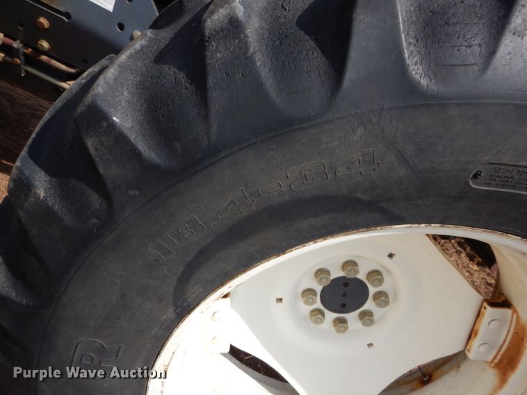 image for item GK9164 New Holland TV140 bi-directional tractor