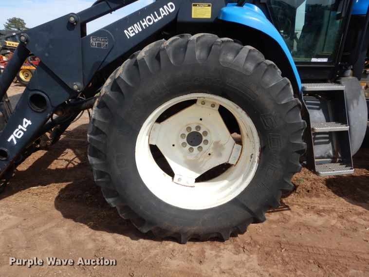 image for item GK9164 New Holland TV140 bi-directional tractor