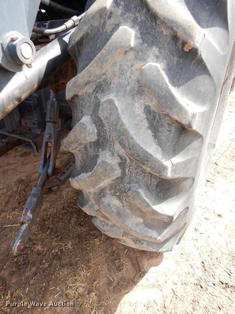 image for item GK9164 New Holland TV140 bi-directional tractor