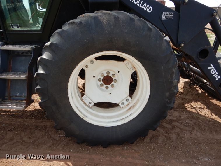 image for item GK9164 New Holland TV140 bi-directional tractor