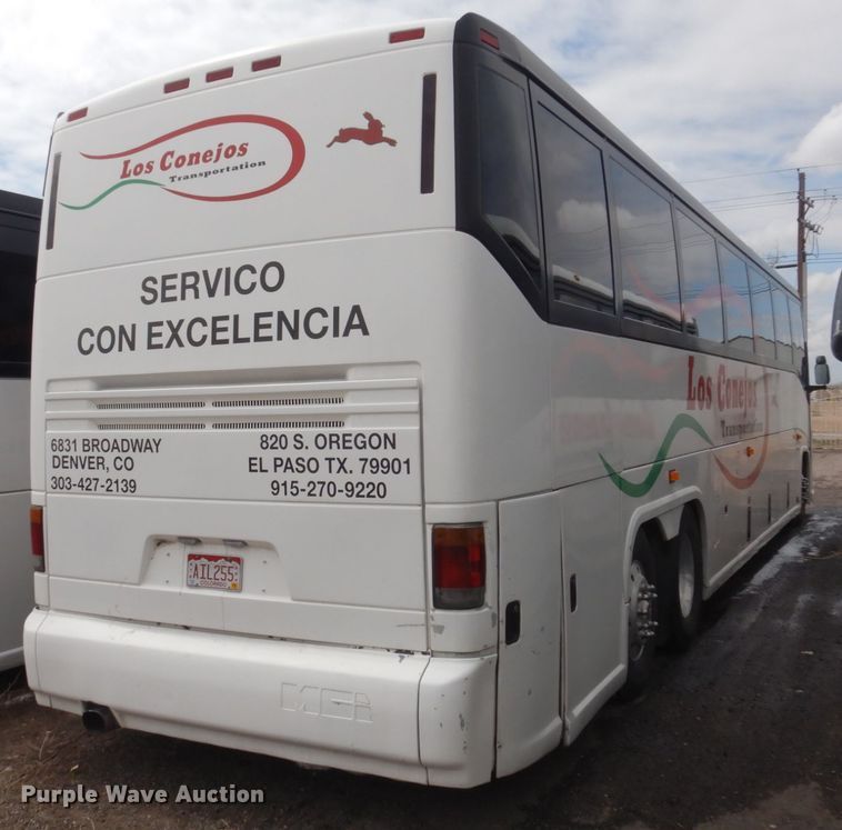 image for item GE9349 2000 MCI 102-EL3 coach bus