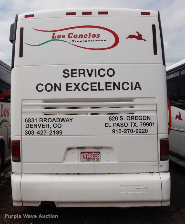 image for item GE9349 2000 MCI 102-EL3 coach bus