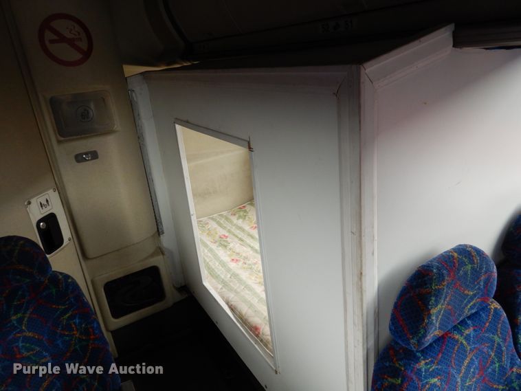 image for item GE9349 2000 MCI 102-EL3 coach bus