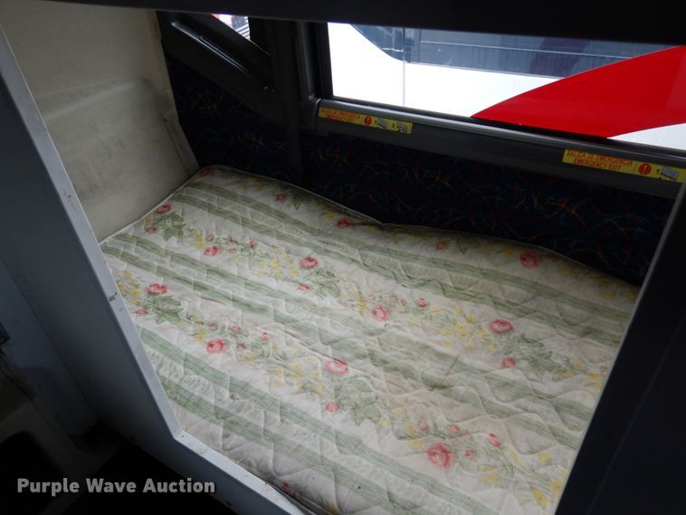 image for item GE9349 2000 MCI 102-EL3 coach bus