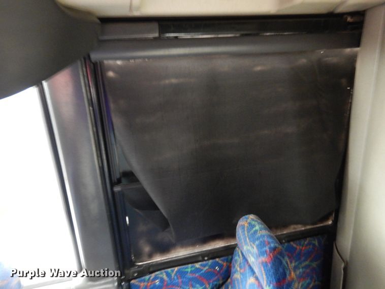 image for item GE9349 2000 MCI 102-EL3 coach bus