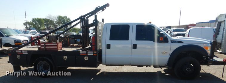 image for item GE9353 2015 Ford F550 Super Duty winch truck