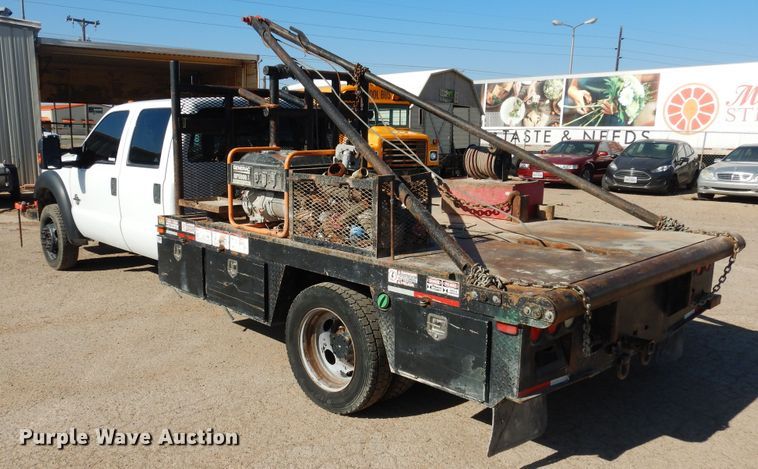 image for item GE9353 2015 Ford F550 Super Duty winch truck