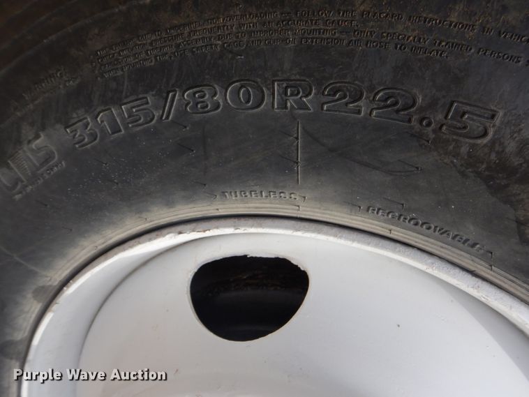 image for item GP9030 2000 Freightliner FL80 roll-off container truck