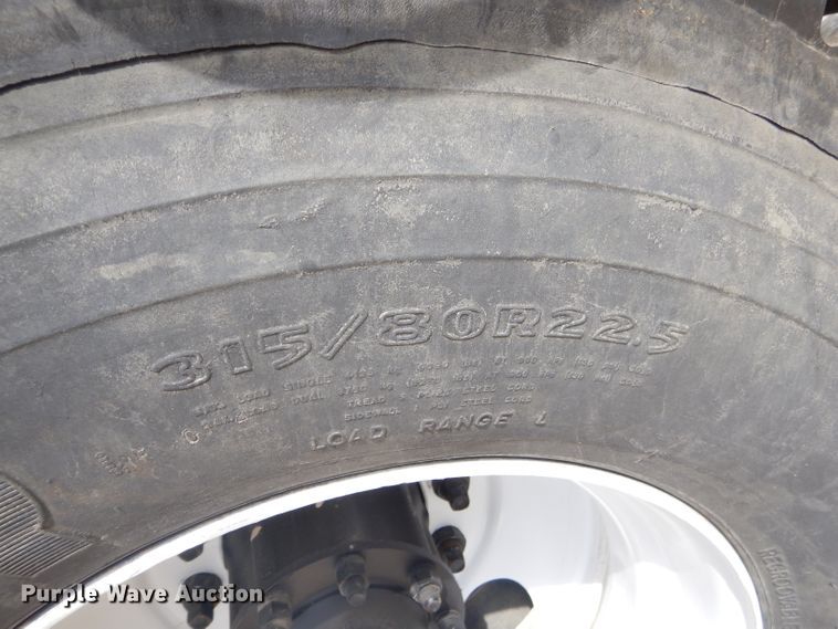 image for item GP9030 2000 Freightliner FL80 roll-off container truck