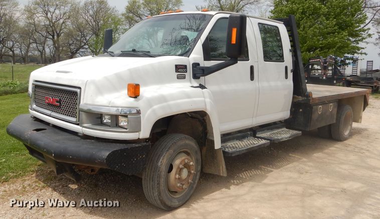 image for item GP9047 2005 GMC C4500 Crew Cab flatbed truck