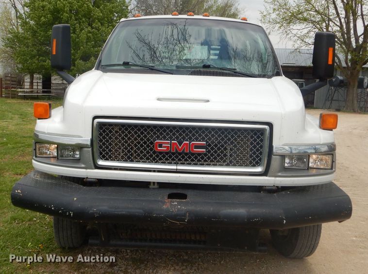 image for item GP9047 2005 GMC C4500 Crew Cab flatbed truck