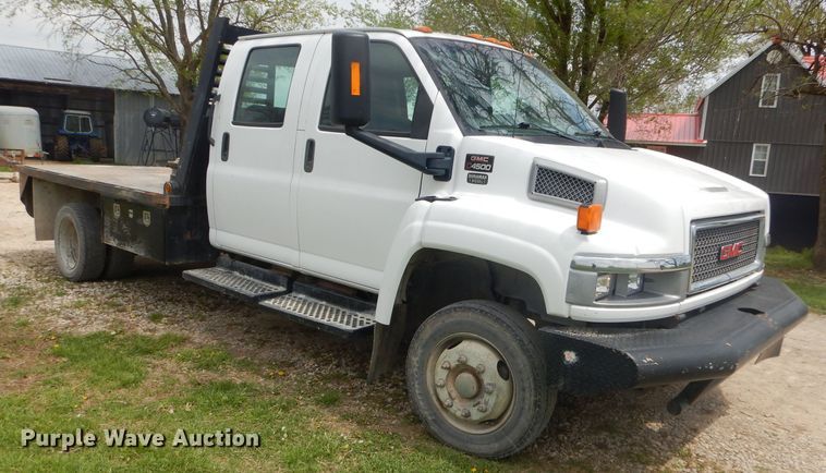 image for item GP9047 2005 GMC C4500 Crew Cab flatbed truck