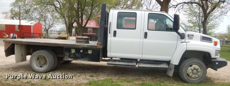 image for item GP9047 2005 GMC C4500 Crew Cab flatbed truck