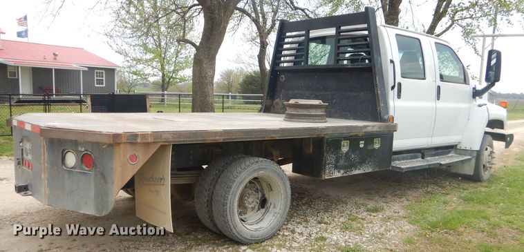 image for item GP9047 2005 GMC C4500 Crew Cab flatbed truck