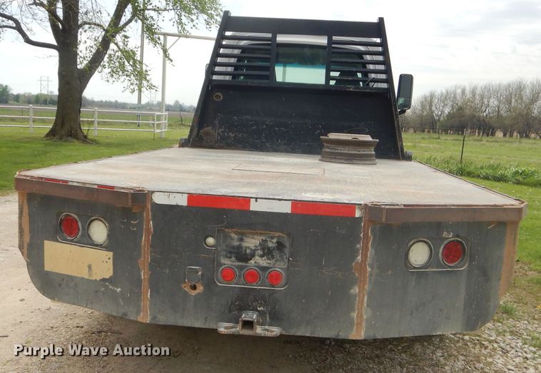 image for item GP9047 2005 GMC C4500 Crew Cab flatbed truck