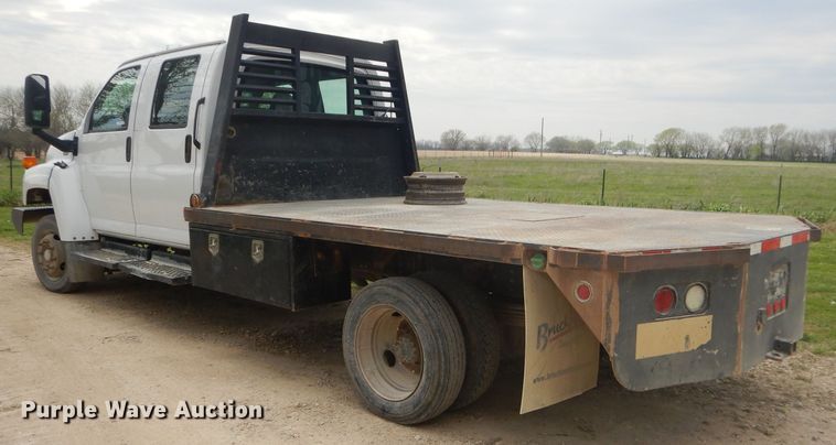image for item GP9047 2005 GMC C4500 Crew Cab flatbed truck