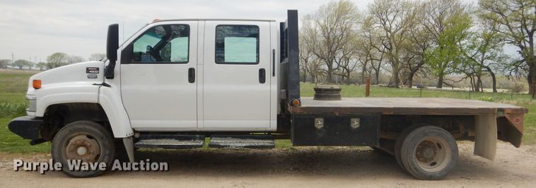 image for item GP9047 2005 GMC C4500 Crew Cab flatbed truck