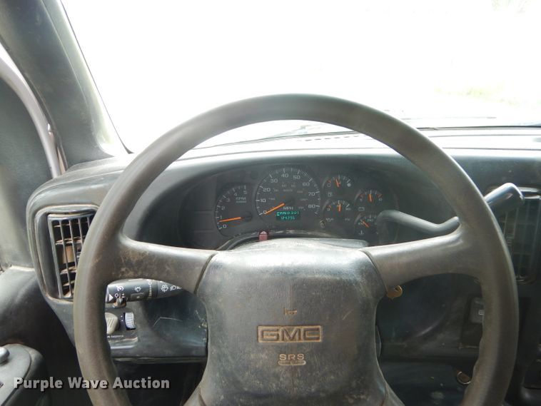 image for item GP9047 2005 GMC C4500 Crew Cab flatbed truck