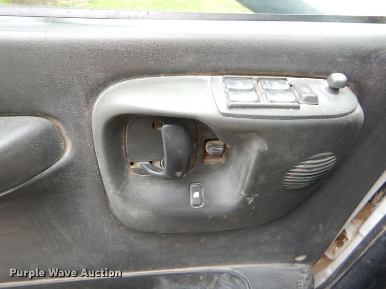 image for item GP9047 2005 GMC C4500 Crew Cab flatbed truck