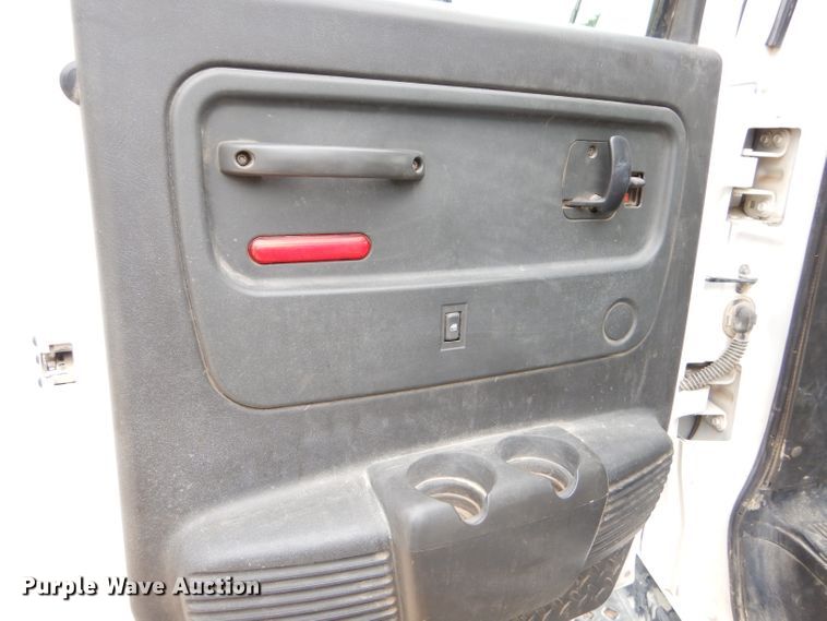 image for item GP9047 2005 GMC C4500 Crew Cab flatbed truck