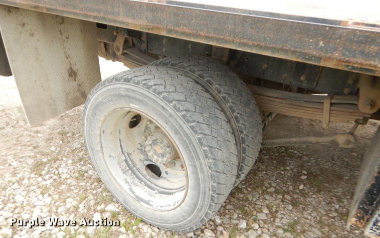 image for item GP9047 2005 GMC C4500 Crew Cab flatbed truck