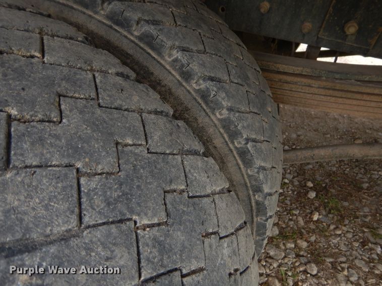 image for item GP9047 2005 GMC C4500 Crew Cab flatbed truck