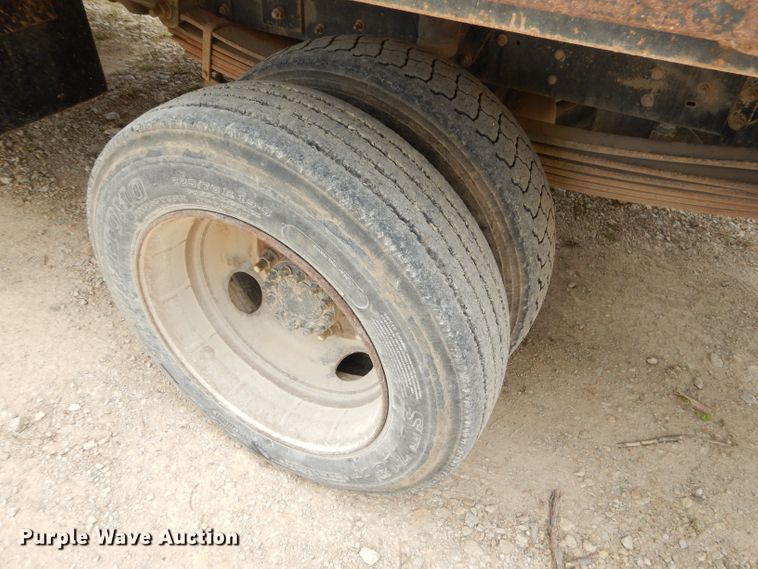 image for item GP9047 2005 GMC C4500 Crew Cab flatbed truck