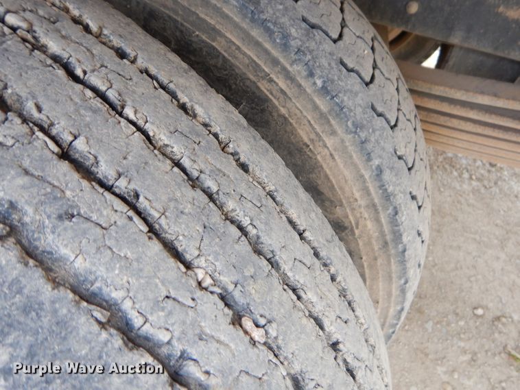 image for item GP9047 2005 GMC C4500 Crew Cab flatbed truck