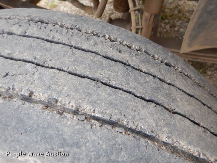 image for item GP9047 2005 GMC C4500 Crew Cab flatbed truck