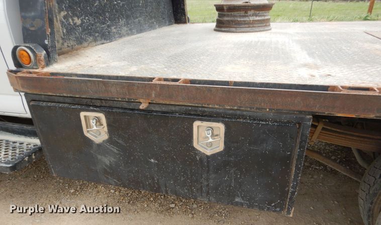 image for item GP9047 2005 GMC C4500 Crew Cab flatbed truck