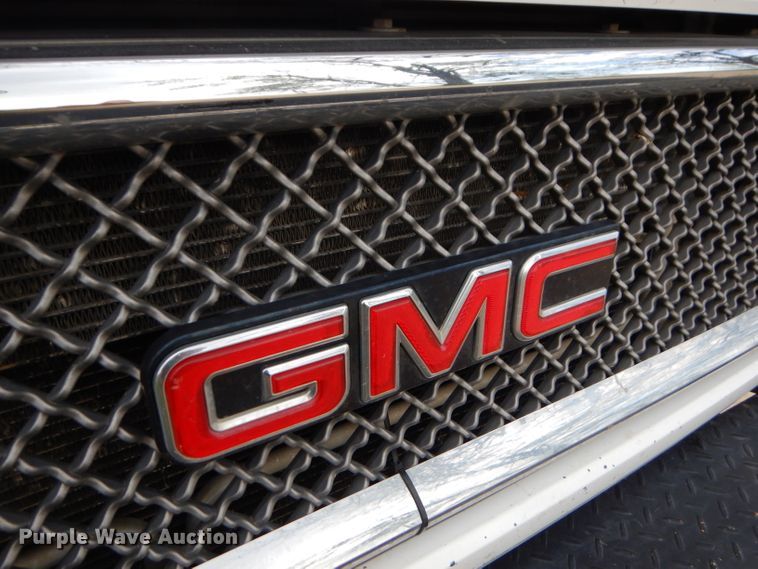 image for item GP9047 2005 GMC C4500 Crew Cab flatbed truck