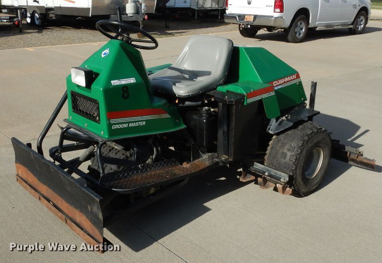 image for item HT9109 2000 Cushman Groom Master bunker rake
