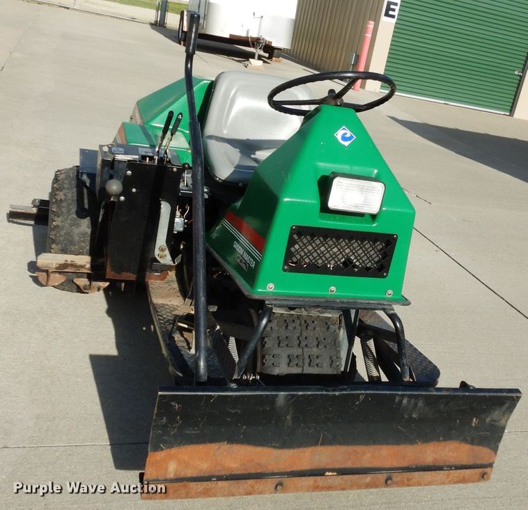 image for item HT9109 2000 Cushman Groom Master bunker rake
