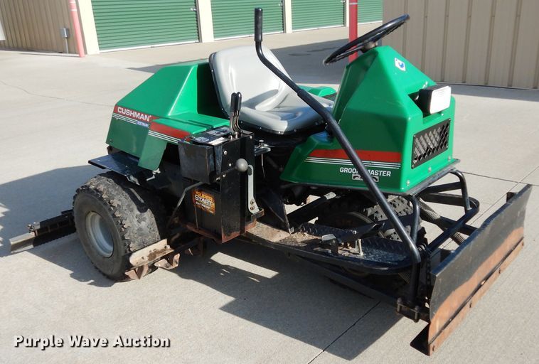 image for item HT9109 2000 Cushman Groom Master bunker rake