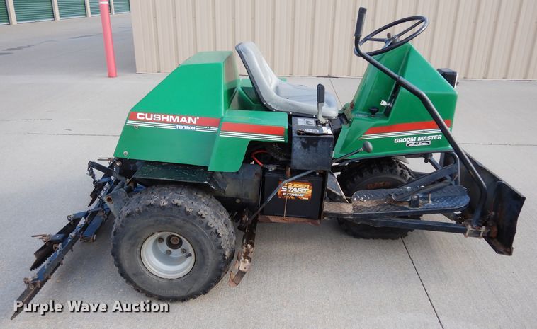 image for item HT9109 2000 Cushman Groom Master bunker rake