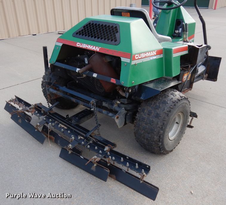 image for item HT9109 2000 Cushman Groom Master bunker rake