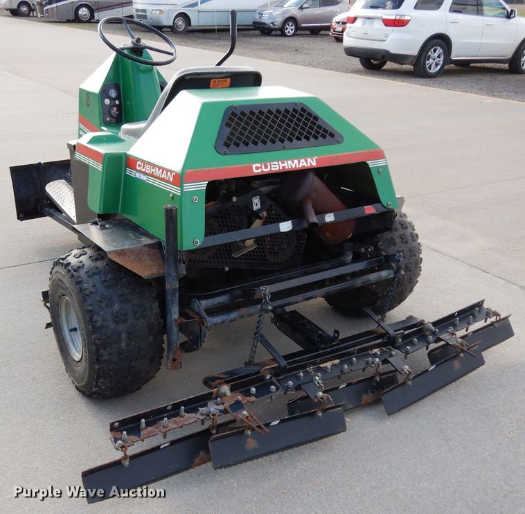 image for item HT9109 2000 Cushman Groom Master bunker rake