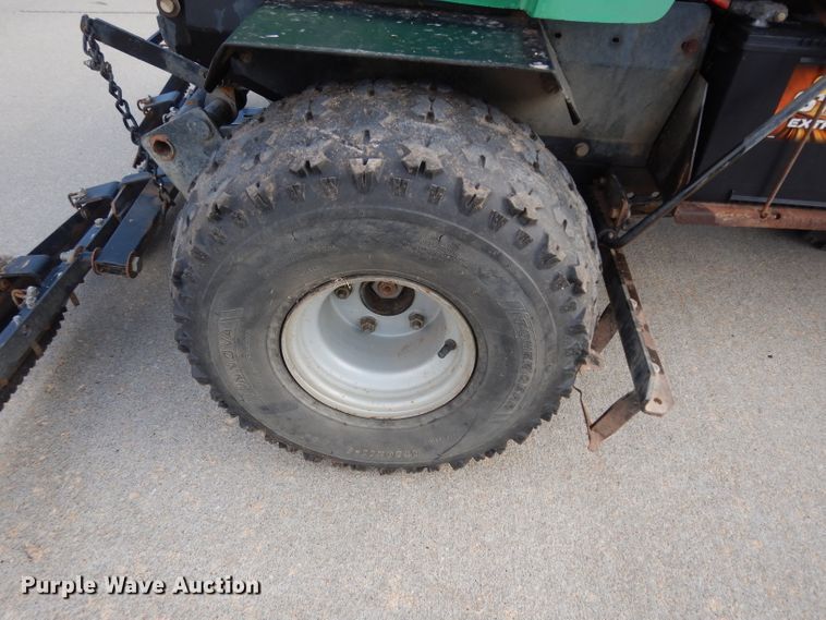 image for item HT9109 2000 Cushman Groom Master bunker rake
